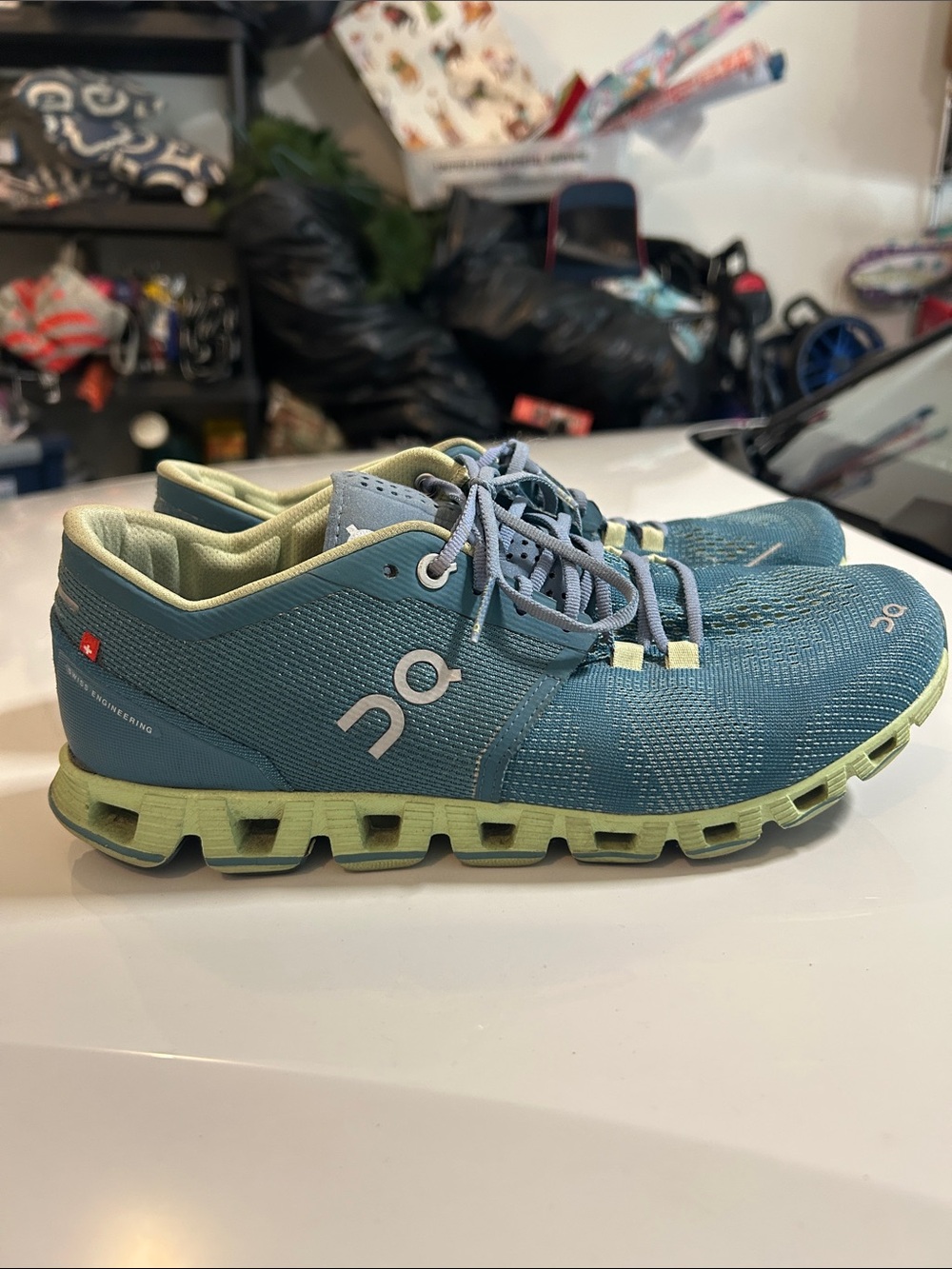 On Women's Running Shoes in Teal and Light Green